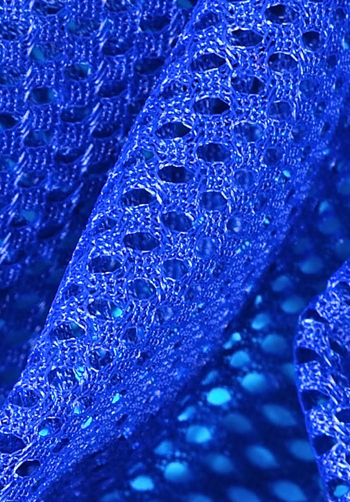 Bright blue fabric dye could help solve renewable energy's biggest